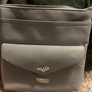 Brand: Carlos by Carlos Santana, medium size crossbody purse, baby blue